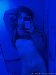 Serving blue alien goddess energy from the airplane lavatory with a