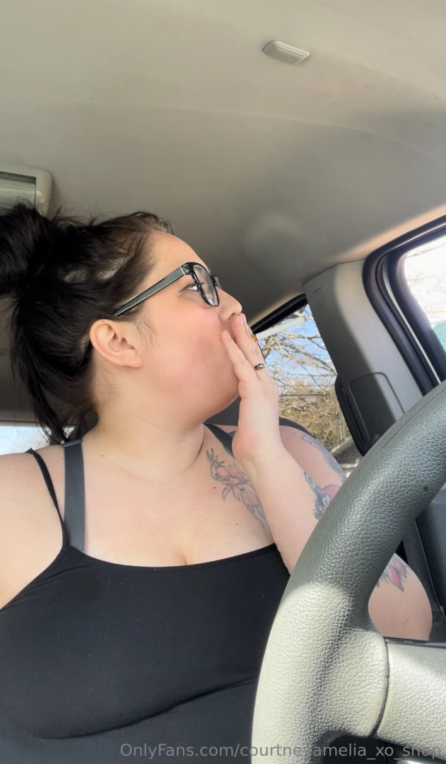 Risky topless smoking in the car i almost got caught i took this video 