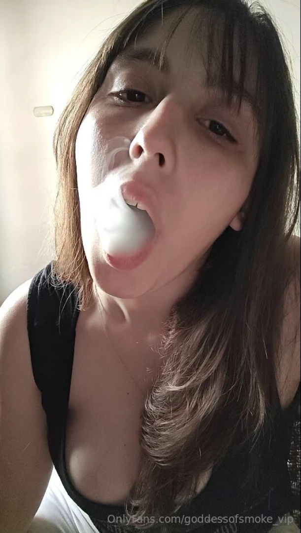 A sensual morning smoking session in the kitchen bathed in natural 