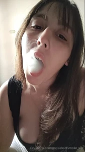 A sensual morning smoking session in the kitchen bathed in natural