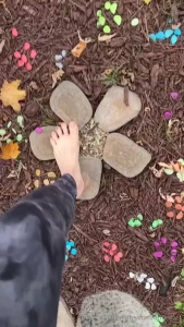 Playing on the garden stones