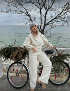 The wind hits my face my fingers are a little cold but i keep pedaling