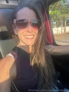 Cums off tops off sunglasses on smile on it s weekend time