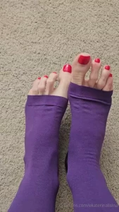 Long toes with red nail polish what could be better