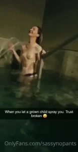 Getting sprayed with cold water in a hot springs by my lady friend