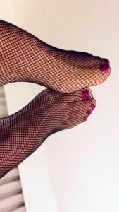 3 21 20 fishnet clad feet