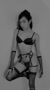 Embracing a blend of playful charm and seductive confidence because a