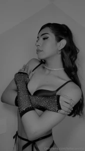 Embracing a blend of playful charm and seductive confidence because a part 2