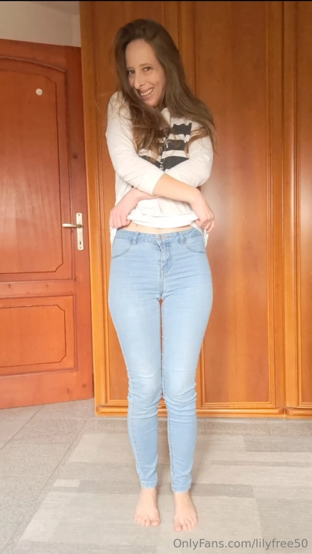 In this video i take off a pair of jeans and a top very slowly so you 
