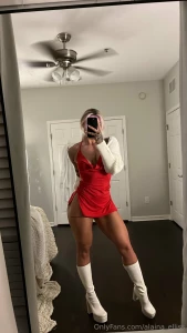 Thigh highs and a mini red dress might as well get on your knees now