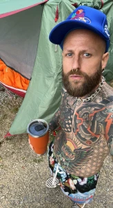 Camping is more fun with no shirt on
