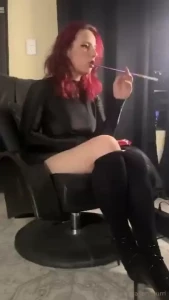 Lips wrapping a nice long cigarette held by my purple holder which i