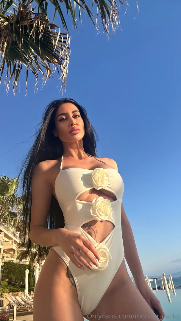 White on the beach bold choice or perfect contrast this swimsuit feels 