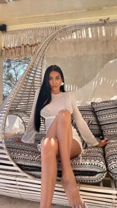 There s something about sitting in a hammock in a short dress the way