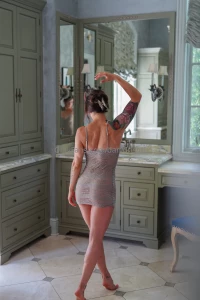 The queen archetype stands rooted in her power and is a natural leader