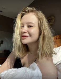 There s a raw authenticity in the way she carries herself her bare