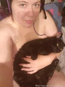 When you re trying to game but your cat just wants to cuddle