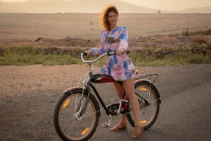 Here are three pics of me with my bikes one in tight leggings and