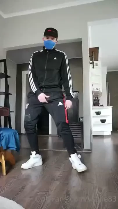 Wearing my cum rag adidas trackies playing with my horny cock and 