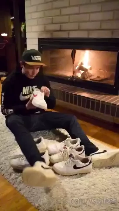 Enjoying a nice evening by the fireplace with four pairs of my nike 