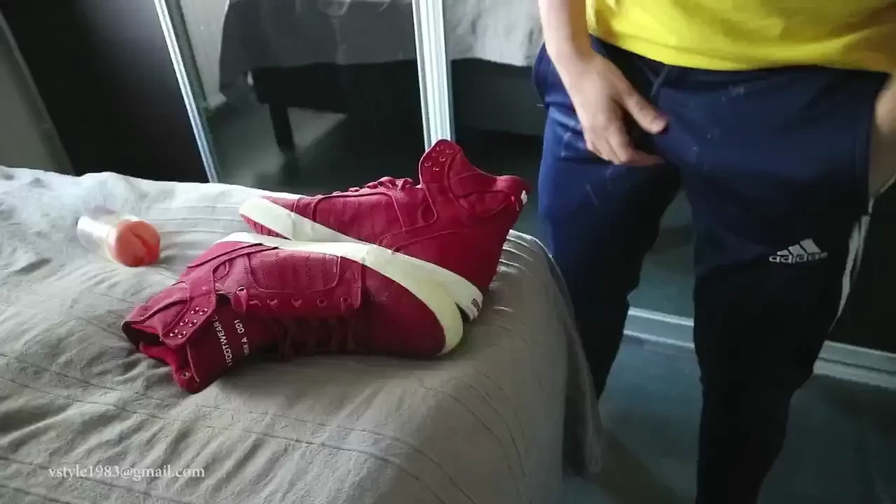 Wearing my cummed adidas trackies and playing with a pair of red 