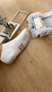 Cleaning my floor with my socks and not with cleaning essentials just