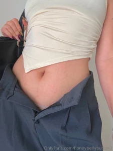 Tummy on display after a long day of work swipe for more and unlock part 1