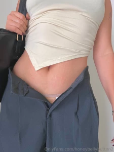 Tummy on display after a long day of work swipe for more and unlock part 2
