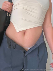 Tummy on display after a long day of work swipe for more and unlock part 3