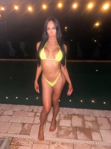 This yellow bikini barely made it through this shoot think you can