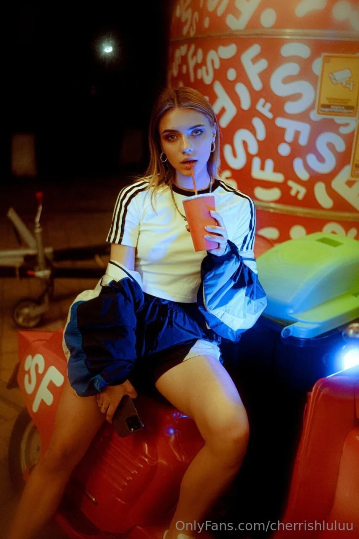 A bit of evening vibes bright lights a cool drink and me what do you 