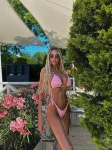 Sun s out curves poppin skin glowing looking like i belong on a yacht