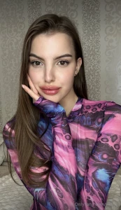 Draped in the elegance of a unique blouse that tells a story of style