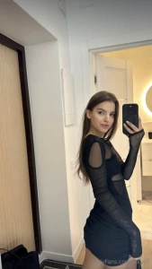 Wrapped in the timeless embrace of noir allure i grace the moments in