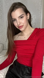 Basking in the beauty of femininity with this stunning red sweater