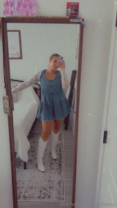 Rocking this dress and boots combo making it hard to focus