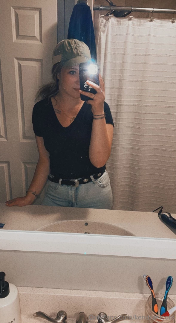 Caught in a reflective moment in the bathroom 