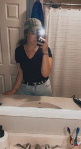 Caught in a reflective moment in the bathroom