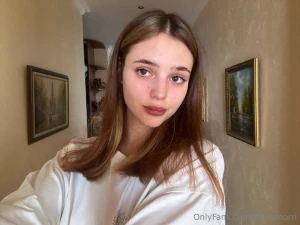 The sun is setting coloring the sky in purple and gold tones an part 1