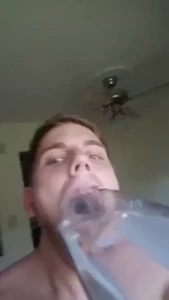 Interesting mouth stretching on a 10inch wide water bottle w tongue