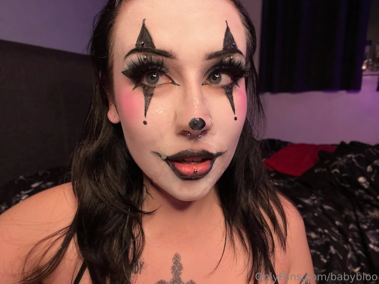 This clown had their face painted twice part 1 