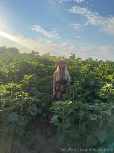 Photo dump of me in a sunflower patch which photo is your favorite let part 2
