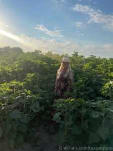 Photo dump of me in a sunflower patch which photo is your favorite let part 4