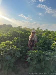 Photo dump of me in a sunflower patch which photo is your favorite let part 6