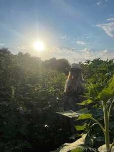 Photo dump of me in a sunflower patch which photo is your favorite let part 7