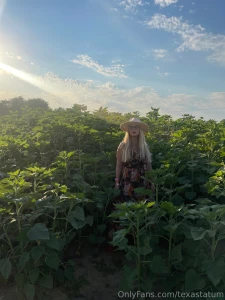 Photo dump of me in a sunflower patch which photo is your favorite let part 8