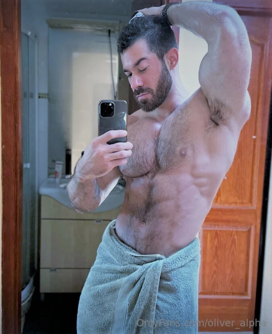 Fresh out the shower flexed and dripping towel s barely hanging on 