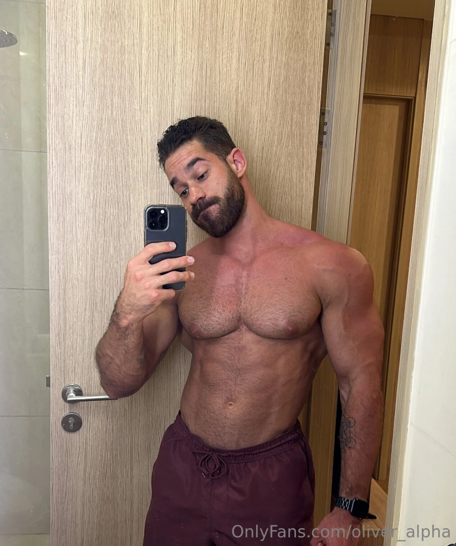 Caught in the mirror shorts tight and cock standing proud if you saw 