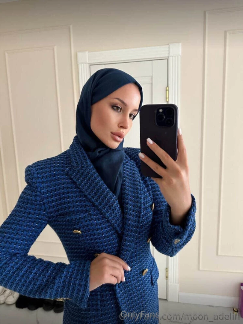 The combination of a blue jacket and burqa is the perfect balance of 