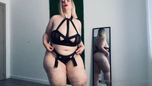 Sensual dance in strappy outfit